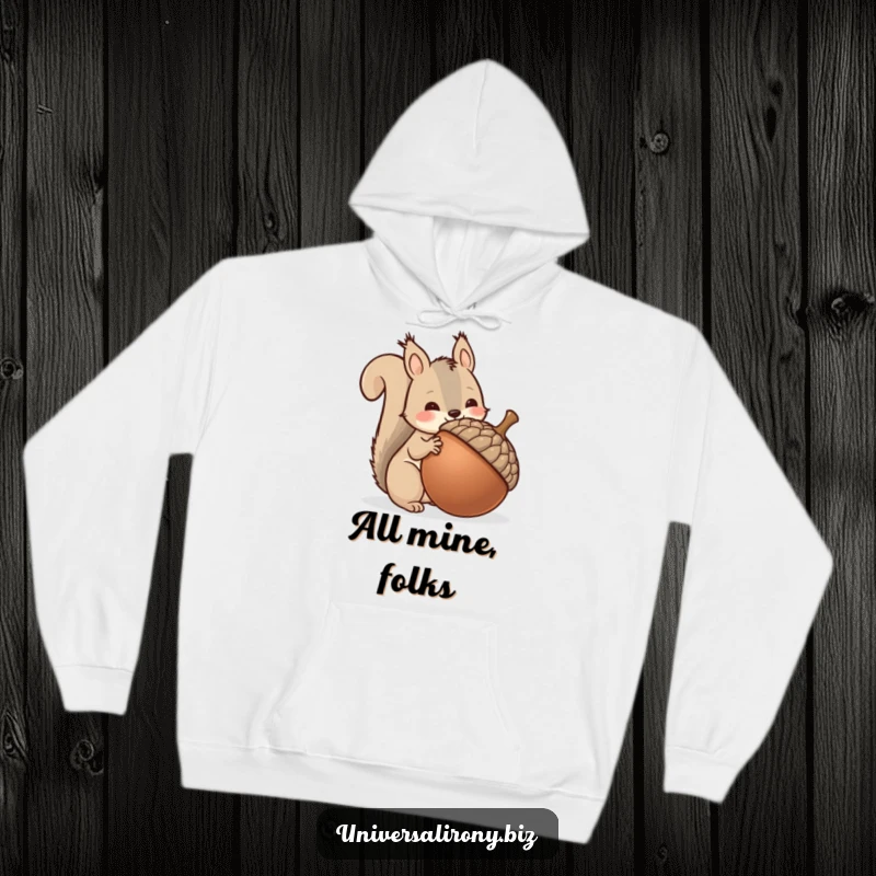 Funny kawaii squirrel hoarding an oversized acorn, featured on a warm hoodie, perfect for cozy collector vibes.