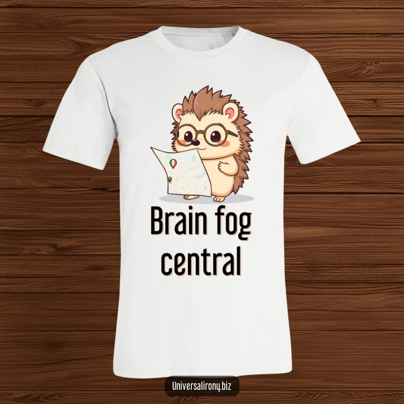 Funny kawaii hedgehog wearing spectacles, looking bewildered by a large map, on a soft t-shirt for thinkers.